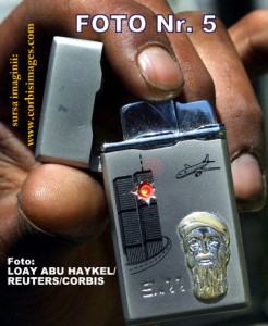 Palestinian man holds cigarette lighter with engraved face of Osama bin Laden